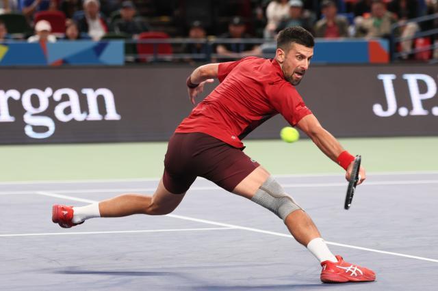 开云数字工具-张奔斗：高能量人士德约科维奇的平衡之道